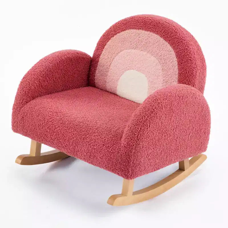Poltroncina imbottita a dondolo per bambini, in morbido tessuto teddy sfumato, con struttura in legno, ideale per la lettura